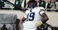 Justice Haynes runs for 152 yards and 2 TDs as No. 25 Michigan beats Michigan State 31