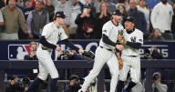 Ryan McMahon flips head over heels into Red Sox dugout to make highlight