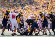 How Lou Esposito evaluates Michigan defensive line and what he expects versus USC