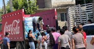 IMCC entrega agua potable y suministros a comunidades afectadas por ‘Raymond’