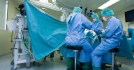 Brain surgeon arrested after 'letting daughter, 12, drill into patient's skull'