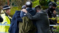 Man kills 2 and wounds 4 in car ramming and stabbing at English synagogue on Jewish holy day
