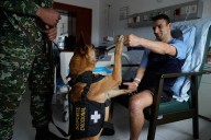 Colombian soldiers find solace in 'furry force' emotional support dogs
