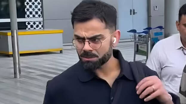 Virat Kohli returns to India after four months, sporting a stylish look with dark hair