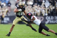How involved was Greg Schiano in Rutgers’ defense as it showed improvement in win over Purdue?