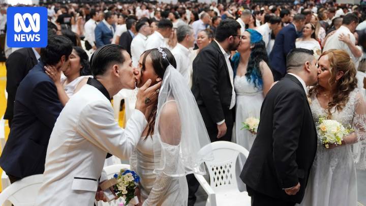 Mass civil wedding in Paraguay's capital sees more than 600 couples say 'I do' in unison