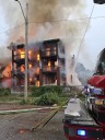Kansas City firefighters battle massive fire at apartments