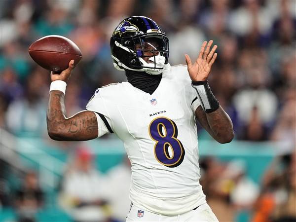 Lamar Jackson torches Miami with 4 TD passes in return from injury and Ravens rout Dolphins 28