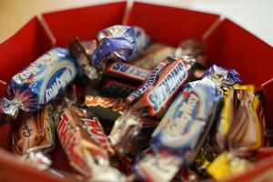 Trick or Treat yourself? Most can’t resist sneaking Halloween candy