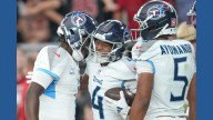 Titans rally late to edge Cardinals 22