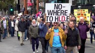 Thousands of protesters march through London streets against digital ID plans