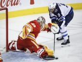 Scheifele scores late as Jets burn Flames 2