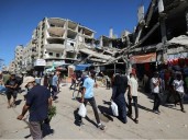 Gazans return to razed homes