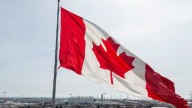 Canada's merchandise trade deficit widened in August, with exports falling faster than imports rose