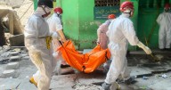 Indonesian crews pull more bodies from rubble of collapsed school as death toll rises