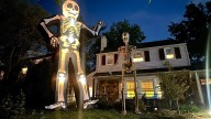 I put Home Depot's 12-foot Skelly and Lowe's 20-foot inflatable Skeleton in my yard — and this one wins Halloween