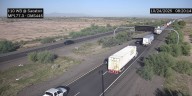 Part of I-10 shut down after vehicle crashes into semi