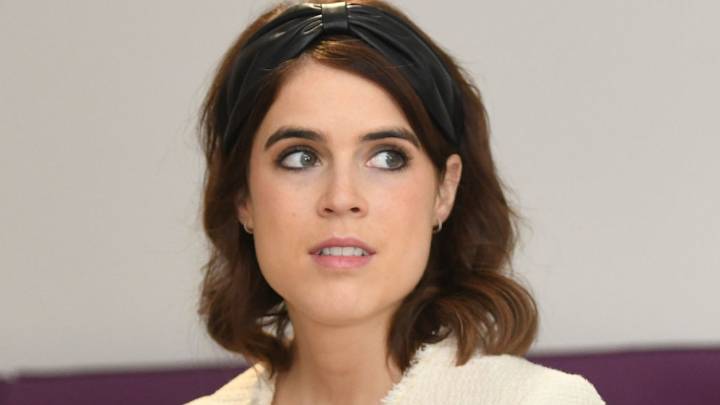 Princess Eugenie is radiant in silky slip skirt and knee-high boots for touching outing