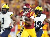 Miller powers USC to a 31-13 victory over Michigan