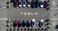 Tesla’s profit tumbles after costs undermine record EV sales