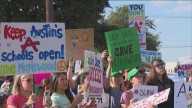Families rally at Austin ISD headquarters to oppose school consolidations