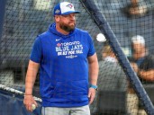 The time John Schneider left an in-game interview to argue with umpire