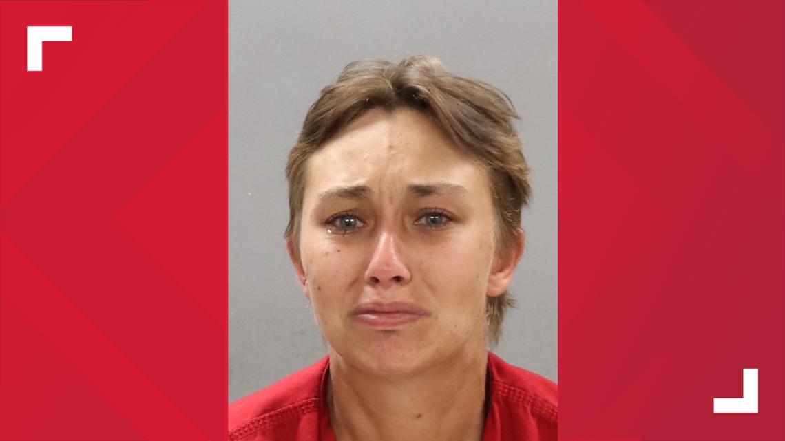 Police: Woman arrested after witnesses see her punch 7