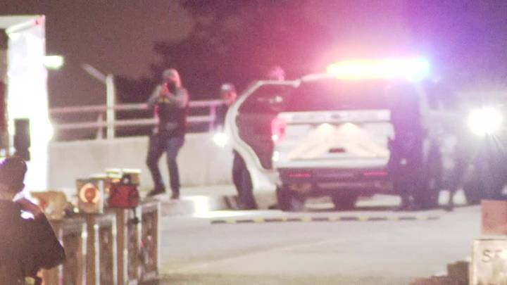 Coast Guard fires at U-Haul, 2 struck after daylong immigration protest