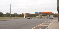Holiday weekend drivers face slick commute