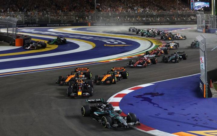 Motor racing-Russell wins Singapore Grand Prix, McLaren take constructors’ title