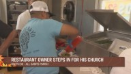Restaurant owner helps his church's booth at Fall Festival