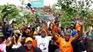 Mourners storm Kenyan airport to receive Odinga’s body