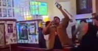 Machete thug storms Glasgow pub and hacks man as horrified punters watch