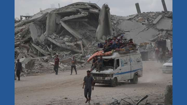 The Latest: Palestinians journey back home as aid convoys enter Gaza and truce holds