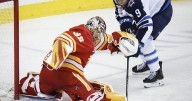 Scheifele scores late as Jets burn Flames 2