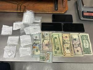 Kennewick police seize drugs, cash and cell phones from driver running red light