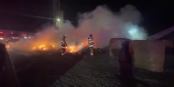Three departments help extinguish fire at feedlot