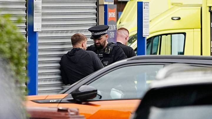 Police say four people injured after car ramming and stabbing outside synagogue in Manchester