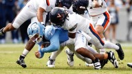 Virginia wins third overtime game of season, holds off UNC 17