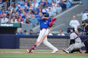 Guerrero grand slam fuels Blue Jays in 13