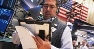 The Dow hits a record as 3M, Coca-Cola and other big US stocks climb