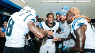 Chuba Hubbard celebrates Rico Dowdle, while neither worries about snap counts