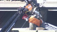 Tow truck hangs from overpass in McKinney, rescue underway