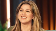 Kelly Clarkson makes a statement in tiny red hot pants during star