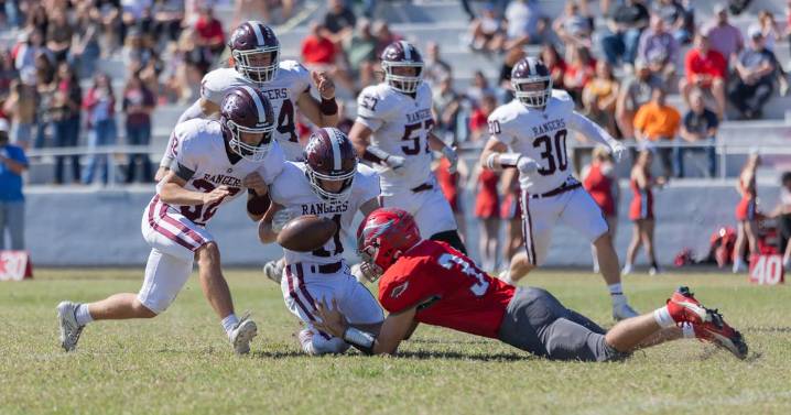 Benton manhandles Redbirds on gridiron