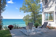 Rare 20-acre Lake Michigan farmhouse atop dunes with private beach hits market at $5.7M