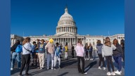 Judge temporarily blocks the Trump administration from firing workers during the government shutdown