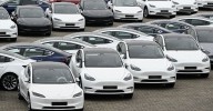 Elon Musk's Tesla posts major earnings drop despite record sales