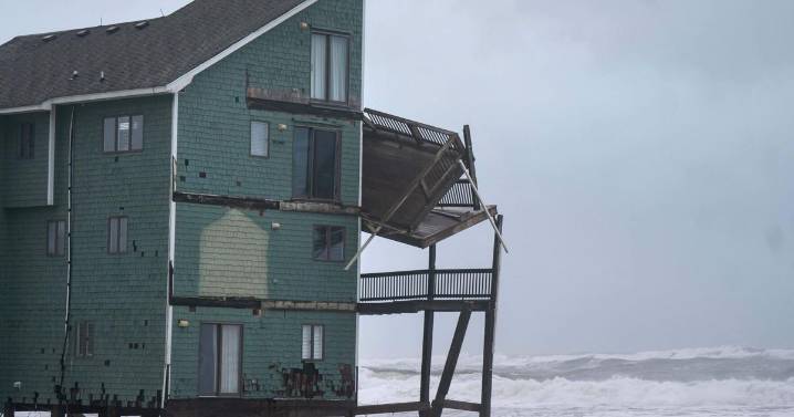 Dozens rescued as remnants of typhoon hits Alaska while nor'easter brings flooding to East Coast