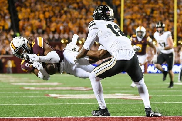 Koi Perich’s interception return lifts Minnesota over Purdue 27